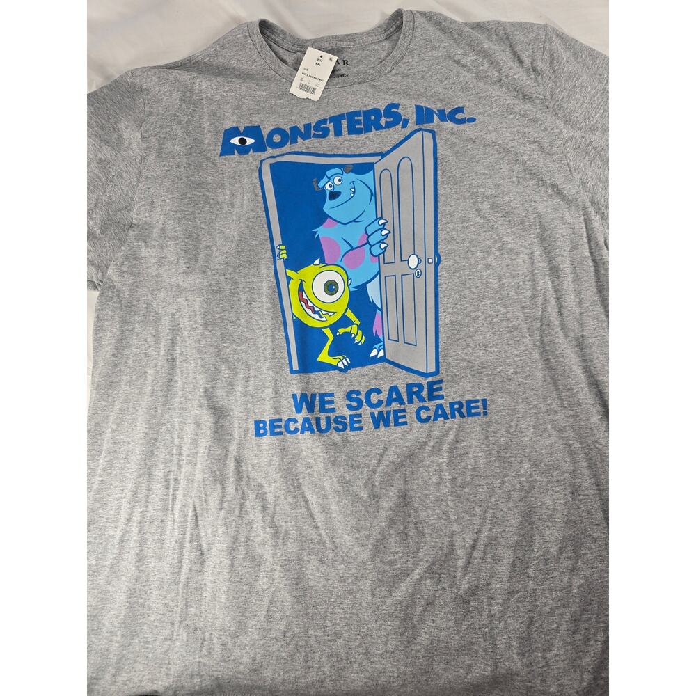 Monsters Inc Pixar Graphic Tee XXL NWT We Scare Because We Care Sulley Mike